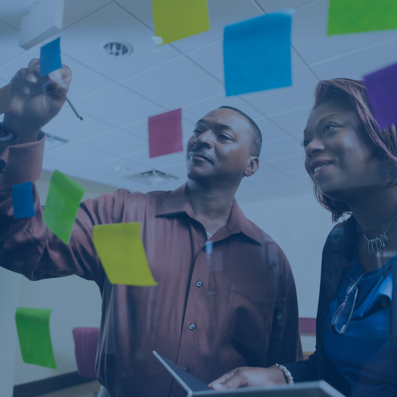 Certification Image of a man and woman organizing a project.